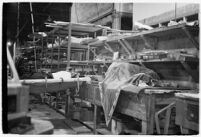 Man sleeping at the Douglas Aircraft Corporation plant where workers participated in a sit-down strike, Santa Monica, 1937