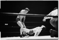 Heavyweight wrestler Vincent López grappling with newcomer El Pulpo at the Olympic, Los Angeles, 1937