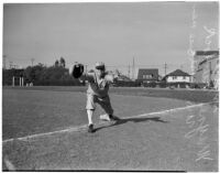 Wayne Murdock, USC Trojans first baseman, poses on the base, Los Angeles, 1940