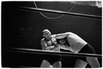 Wrestlers "Daniel Boone" Savage and Hans Steinke battle it out at the Grand Olympic Stadium. June 16, 1937