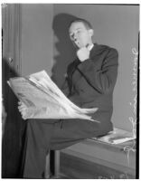 Unidentified detective keeping guard by murderer Robert S. James's jail cell, Los Angeles, 1936