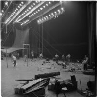 Members of the Polack Bros. Circus set up for their show inside Shrine Auditorium, Los Angeles, June 1946