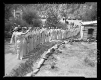 Women in togas at dedication of Golden Lotus Temple of the Self-Realization Fellowship Church in Los Angeles, Calif., 1950