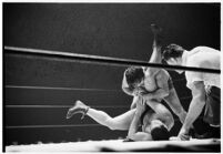 Heavyweight wrestler El Pulpo grappling with an opponent at the Olympic Auditorium, Los Angeles, 1937