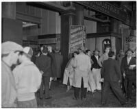 Crowd outside the Goodwill Industries premises in the Baker Block building, picture taken before a fire occurred at the site on January 14, 1938