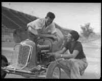 Race car drivers Rex Mays and Bob Swanson pose at the Legion Ascot speedway, Los Angeles, 1935