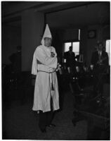 Former Ku Klux Klan Kleagle, Ray J. Schneider, in Klan robes at trial, Los Angeles, 1946