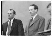 Murder suspect Robert S. James standing between two unidentified men in court, Los Angeles, 1936