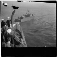 Admiral William F. Halsey departs from the U.S.S. South Dakota after retiring as commander of the battleship, Los Angeles, 1945