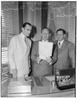 New Universal Pictures Corporation executives William Koenig, Charles R. Rogers and J. Cheever Cowdin at an event, Los Angeles, 1936