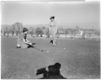 Mrs. Paul S. Sweeny and Bess Marcus playing golf, Los Angeles, 1940s