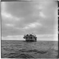 Tony Cornero's newly refurbished gambling ship, the Bunker Hill or Lux, anchored offshore of Los Angeles, 1946