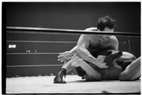 Wrestling match between Italian newcomer Vincent Austeri and Salt Lake City native Del Kunkel at Olympic Auditorium, Los Angeles, 1938