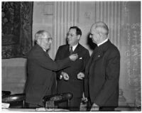 Louis B. Mayer, Rabbi Edgar F. Magnin, and Bishop Bertrand Stevens at the Biltmore Hotel for a meeting concerning fund raising for the National Foundation for Infantile Paralysis, Los Angeles, December 12, 1938