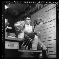 Woman wigmaker at Max Factor in Los Angeles, Calif., circa 1954