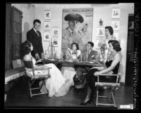 Las Damas Pan Americanas club members in evening clothes, seated at table in Los Angeles, Calif., 1948