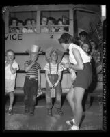 Children arriving for Jewish Center's day camp at Griffith Park in Los Angeles, Calif., 1950