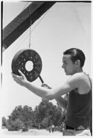 Boy takes part in a free summer camp organized by Los Angeles Sheriff Eugene Biscailuz. Circa July 1937