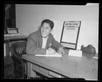 Japanese American Richard Sugimoto enlisting in the U.S. Army following the 1941 attack on Pearl Harbor, Los Angeles, Calif