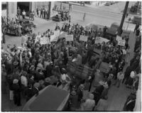 Worker's Alliance member Oscar Fuss addresses a crowd of relief workers protesting a payout bill outside the State Capitol, Sacramento, February 23, 1940