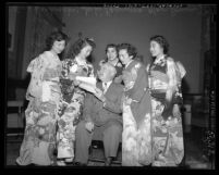 Mayor Fletcher Bowron with five contestants for Nisei Week Queen in Los Angeles, Calif., 1950