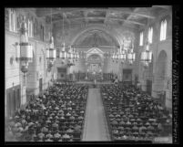 Interior of St. Paul's Catholic Church during Boy Scouts service awards ceremony, Los Angeles, 1949