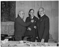 Louis B. Mayer, Rabbi Edgar F. Magnin, and Bishop Bertrand Stevens at the Biltmore Hotel for a meeting concerning fund raising for the National Foundation for Infantile Paralysis, Los Angeles, December 12, 1938