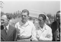 Russian aviators meet the press after breaking the non-stop flight record, flying from Moscow to San Jacinto, CA. July 14, 1937