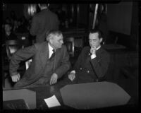 Paul A. Wright and his father J.J. Wright at the trial where Paul A. Wright is charged with the double murder of his wife and best friend, Los Angeles, November, 1937