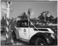 Man stops to talk to LAPD officers Jack Hoyt and Douglas Gourley, Los Angeles