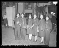 Six Filipino American nurses arriving in after release from Japanese prison, Los Angeles, 1945