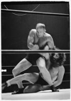 Wrestlers "Daniel Boone" Savage and Hans Steinke battle it out at the Grand Olympic Stadium. June 16, 1937