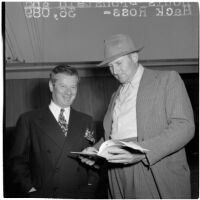 Owner, Louis Bronstein, and trainer, Hack Ross, of race horse Holly Tree together at Santa Anita Park, Arcadia, March 1946