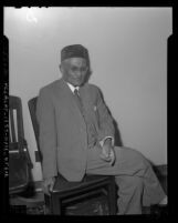 Curuppumullage Jinarajadasa, seated portrait, 1949