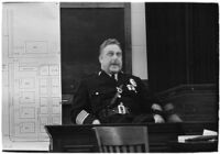 Police Chief James E. Davis testifying before the grand jury about the attempted murder of Harry Raymond, Los Angeles, 1938