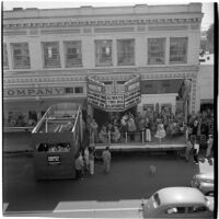 View of street shops during the post-war Labor Day parade, Los Angeles, 1946