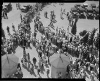 Crowds gather to watch Bob Swanson and Rex Mays race at the Legion Ascot Speedway, Los Angeles, 1935