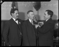 Deputy Sheriffs Yorba and Shehi retire and receive a special badge from Sheriff Eugene W. Biscailuz, Los Angeles, 1934