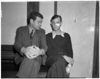 Accused murderer John Frank Reavis with Deputy Sheriff Pat Kelley at Reavis's trial, Los Angeles, May 1940