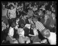 Gus Arriola drawing for children in Los Angeles, Calif., 1949