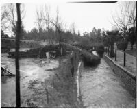 Damage after near-tornado level winds and rain strike Alhambra and neighboring communities. February 13, 1936