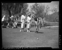 Gloria Fecht, Carmen Foster, and Golda Duncan playing golf, Calif., 1951