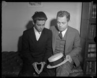 Louis Payne sits with father, Lucius F. Payne, on the day of his inquest, Los Angeles, June 6, 1934