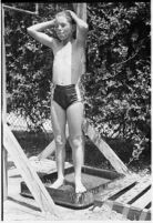 Boy takes part in a free summer camp organized by Los Angeles Sheriff Eugene Biscailuz. Circa July 1937