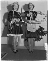 Clubwomen Mrs. Charles R. Smith and Mrs. Leon Kassob dressed up for Valentine's Day, Los Angeles, 1940s