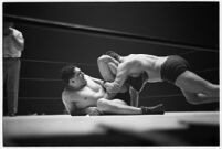 Heavyweight champion Dean Detton wrestling an opponent at the Olympic Auditorium, Los Angeles, 1937