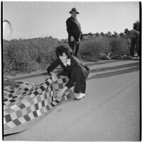 Winnie Medicke setting up camp outside Port Hueneme for a surplus supply sale, Port Hueneme, July 15, 1946