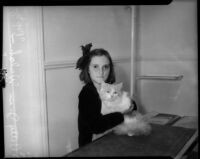 "Pop-eye," a brave Persian housecat, and his owner Betty Jean Welch