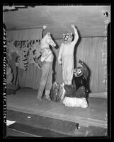 Three performers in animal suits for "The Last War" play at First Congregational Church of Los Angeles, Calif