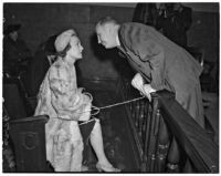 Dr. George K. Dazey and his third wife, Dorcas Dazey, at the trial where Dr. Dazey is accused of the murder of his second wife, Doris S. Dazey, Los Angeles, 1939-1940